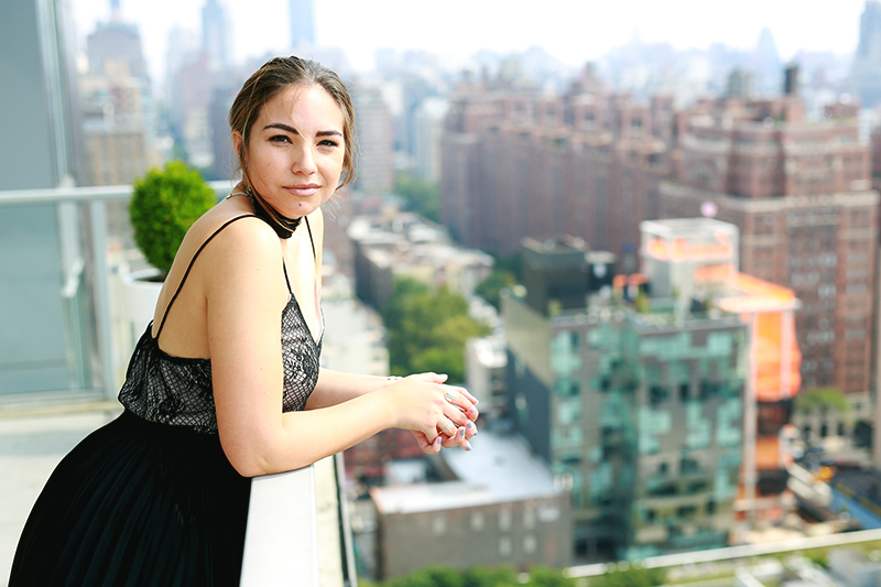 Lauryncakes with NYC as a backdrop, talking about how to get into New York Fashion Week