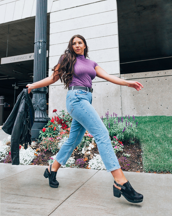 SLC Blogger Lauryncakes wears high waist mom jeans and clogs with a leather jacket in Utah