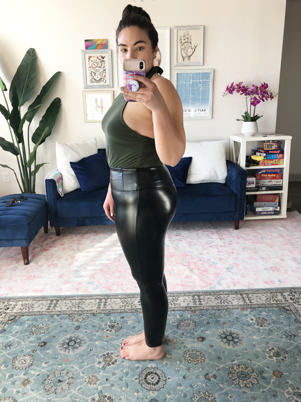 side view of Lauryncakes trying on alternative Spanx leggings that are under $20 and come in plus sizes