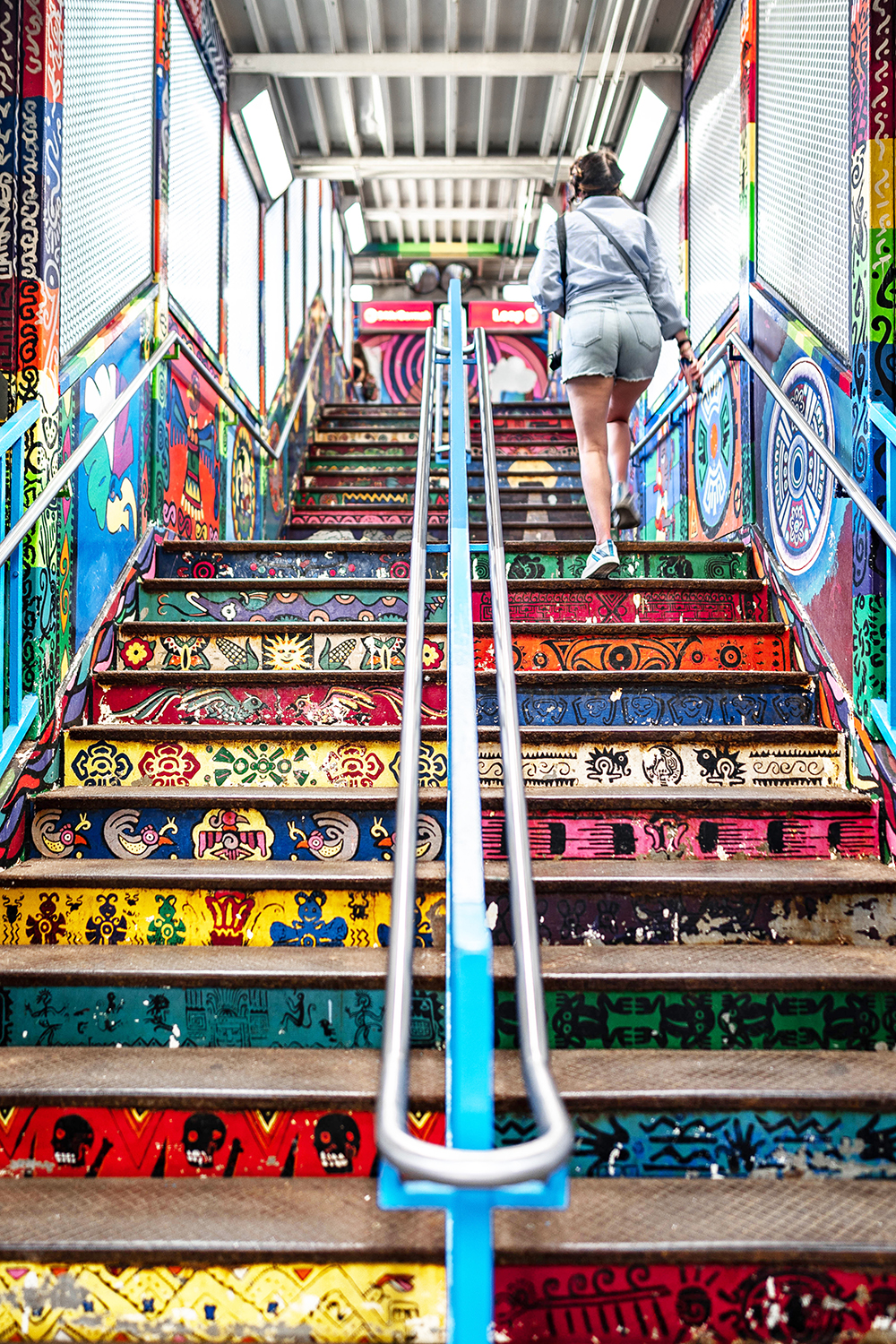 Colofully painted stairs in the subway of Pilsen, Chicago