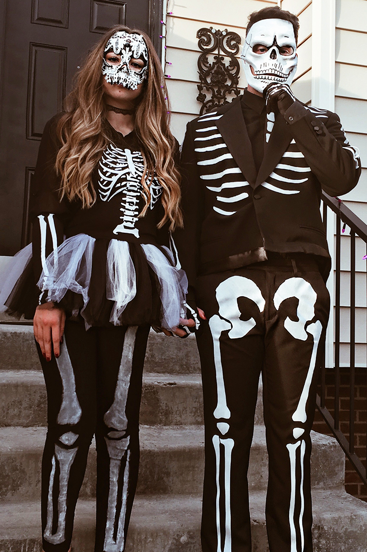 spooky scary skeleton couple's costumes with bones for halloween
